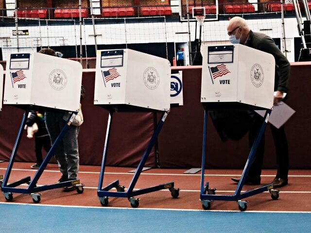 NEW YORK, NEW YORK - NOVEMBER 02: People visit a voting site at a YMCA on Election Day, No