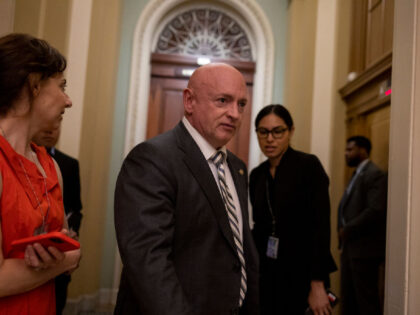 WASHINGTON, DC - JUNE 14: Sen. Mark Kelly (D-AZ) walks through the U.S. Capitol Building a