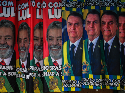 Towels with images of presidential candidates Lula da Silva and Jair Bolsonaro are displayed in a street stand to be sold in downtown Sao Paulo ahead of Presidential Elections on September 21, 2022 in Sao Paulo, Brazil. Brazilians will go to polls on October 02 in a polarized presidential election. …