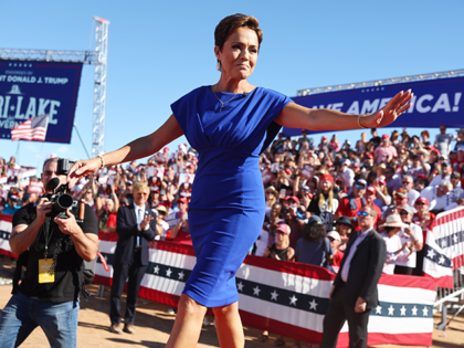 Arizona Republican gubernatorial nominee Kari Lake walks to the podium at a campaign rally attended by former U.S. President Donald Trump at Legacy Sports USA on October 09, 2022 in Mesa, Arizona. Trump is campaigning for Arizona GOP candidates ahead of the midterm election on November 8. (Photo by Mario …