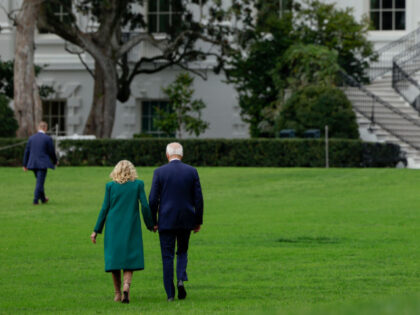 WASHINGTON, DC - OCTOBER 24: U.S. President Joe Biden and first lady Jill Biden walk on th