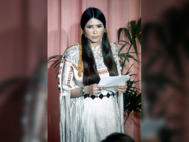Sacheen Littlefeather (Native American actress Maria Cruz) holds a written statement from