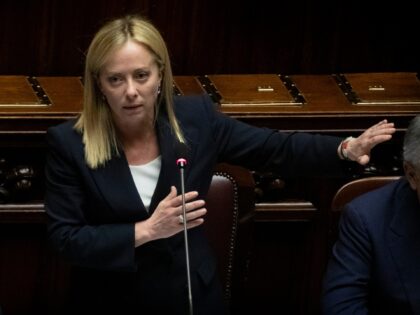 ROME, ITALY - OCTOBER 25: Italy's new Prime Minister Giorgia Meloni addresses the parliament, ahead of a confidence vote at Montecitirio palace in Rome on October 25, 2022 on October 25, 2022 in Rome, Italy. Italians voted in far-right politician Giorgia Meloni Meloni as Italy's first woman Prime Minister. The …