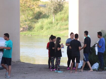 Migrant groups continue to stream across the Rio Grande on the first day of the new fiscal year. (Randy Clark/Breitbart Texas)