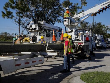 Florida Power & Light Co. (FPL) emergency response team workers following Hurricane Ian in Fort Myers, Florida on Sunday, Oct. 2, 2022. Five days after Hurricane Ian slammed into Florida, bringing with it a deadly storm surge, catastrophic flooding and powerful winds, the death and destruction it has wrought are …
