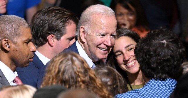 Joe Biden Grabs Young Girl's Shoulders, Tells Her 'No Serious Guys Until You're 30'