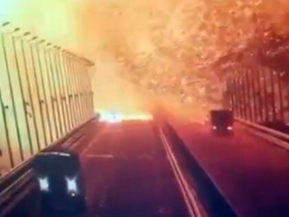 CRIMEA - OCTOBER 08: A screen grab from a surveillance footage shows flames and smoke rising up after an explosion at the Kerch bridge (aka the Crimean Bridge) in the Kerch Strait, Crimea, October 8, 2022. A bridge connecting Crimea to Russia caught fire early Saturday morning causing suspension of …