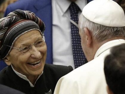 Pope Francis greets Italian politician Emma Bonino in 2015.
