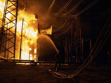 Ukrainian State Emergency Service firefighters put out the fire after a Russian rocket attack hit an electric power station in Kharkiv, Ukraine, Sunday, Sept. 11, 2022. The Kharkiv and Donetsk regions have been completely de-energized in the rocket attack.(Kostiantyn Liberov/AP)
