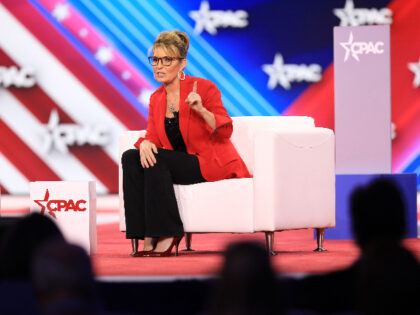 Sarah-Palin-pointing-up-CPAC-2022-getty