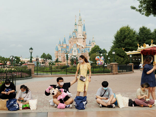 SHANGHAI, CHINA - JUNE 30: People rest infront of the Enchanted Storybook Castle at Shangh