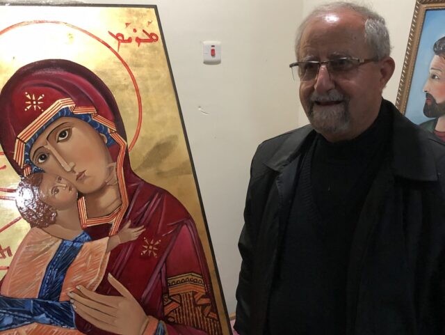 Deacon Ebrahim Lallo, with icon he painted for the Shrine in Clinton MA, picture taken in Bartella, Iraq, December 2021 by Fr. Benedict Kiely