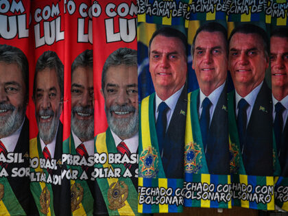 Towels with images of presidential candidates Lula da Silva and Jair Bolsonaro are displayed in a street stand to be sold in downtown Sao Paulo ahead of Presidential Elections on September 21, 2022 in Sao Paulo, Brazil. Brazilians will go to polls on October 02 in a polarized presidential election. …