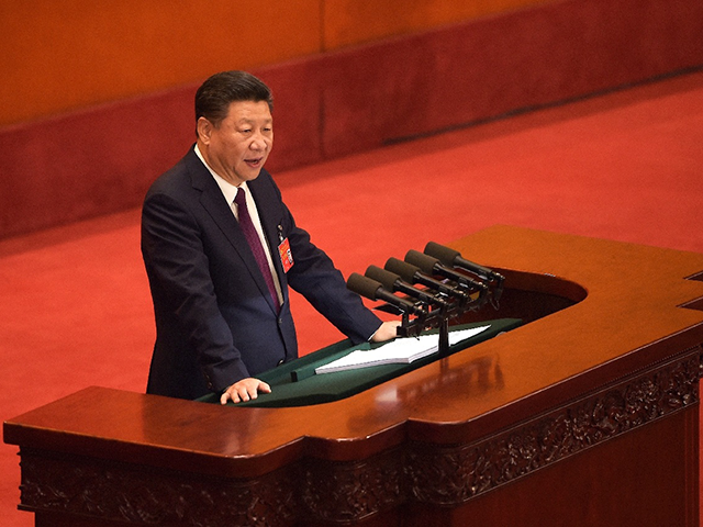China's Xi Jinping is on the brink of securing a historic third term in power (AFP)