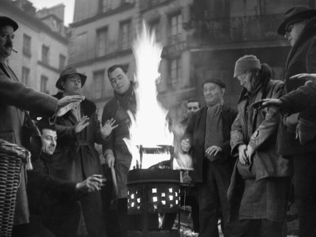 FRANCE - CIRCA 1954: Brazier in the Halles, place Sainte-Opportune. Paris, January 1954. (Photo by Roger Viollet Collection/Getty Images)