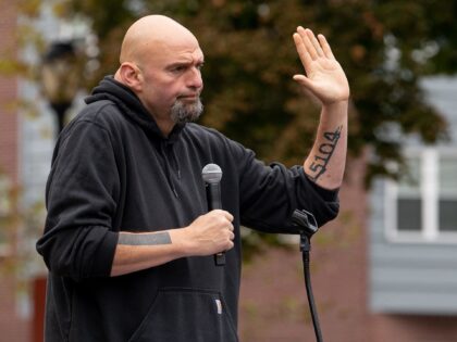 Pennsylvania's Lieutenant Governor John Fetterman speaks to supporters gathered in Dickinson Square Park in Philadelphia on October 23, 2022, as he campaigns for the US Senate. - The US midterm election is scheduled for November 8, 2022. (Photo by Kriston Jae Bethel / AFP) (Photo by KRISTON JAE BETHEL/AFP via …