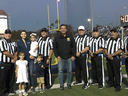 Florida Gov. Ron DeSantis (R) traveled to Naples to perform the opening coin toss at a local high school football game on Friday, just days after Hurricane Ian ravaged the area.