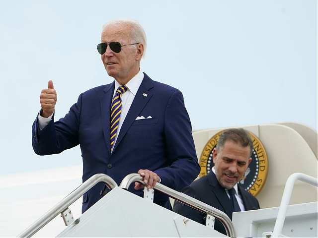 President Joe Biden gives a thumbs up as he boards Air Force One with his son Hunter Biden at Andrews Air Force Base, Md., Wednesday, Aug. 10, 2022. The President is traveling to Kiawah Island, S.C., for vacation. (AP Photo/Manuel Balce Ceneta)