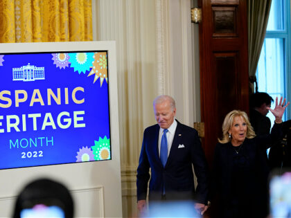 President Joe Biden and first lady Jill Biden arrive to attend a reception in the East Room of the White House for Hispanic Heritage Month in Washington, Friday, Sept. 30, 2022. (AP Photo/Susan Walsh)