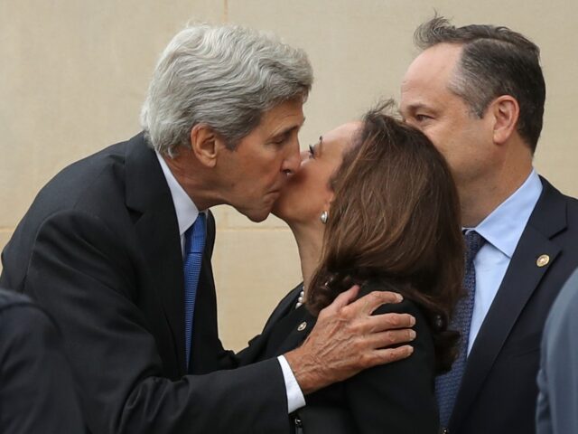 WASHINGTON, DC - SEPTEMBER 1: Former U.S. Secretary of State John Kerry greets Sen. Kamala
