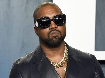 FILE - Kanye West arrives at the Vanity Fair Oscar Party on Feb. 9, 2020, in Beverly Hills, Calif. West, who goes by Ye, is ending the contract between his company Yeezy and the struggling clothing retailer, confirmed his lawyer in an emailed statement to The Associated Press Thursday, Sept. …