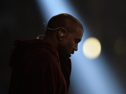 Kanye West performs on stage at the 57th Annual Grammy Awards in Los Angeles February 8, 2015. AFP PHOTO/ROBYN BECK (Photo credit should read ROBYN BECK/AFP via Getty Images)