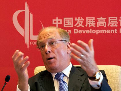 Laurence D. Fink, CEO of BlackRock Inc., speaks at a economic summit a day before the China Development Forum in Beijing, China, Saturday, March 24, 2018. (AP Photo/Ng Han Guan)