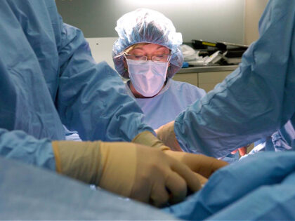 (ga) -- MARCIBOWERS--TRINIDAD, COLORADO, JUNE 6, 2007-- Dr. Marci Bowers performs the transgender operation on Courtney Ridley in the Trinida's Mount San Rafael Hospital to the tunes of Jimmy Buffet, Pink Floyd and others during the three-hour surgery. In this photo, Bowers prepares to remove Ridley's testicles, followed by his …