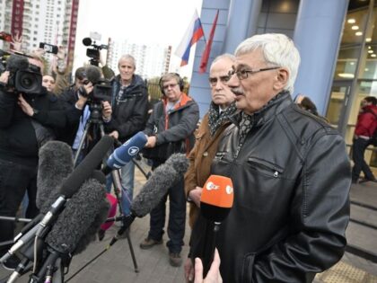 Yan Rachinsky (2R), one of the founders of Memorial rights group, and Oleg Orlov (R), one of Memorial leading activists, meet with the media after the group was co-awarded the 2022 Nobel Peace Prize along with Belarus' human rights advocate Ales Bialiatski and the Ukrainian human rights organisation Center for …