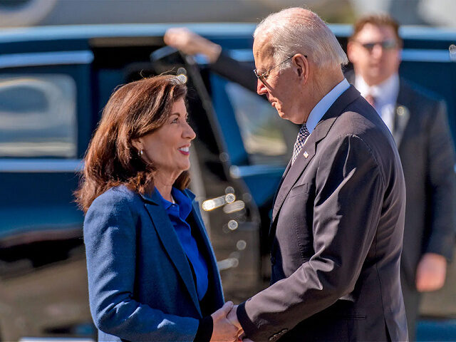 President Joe Biden is greeted by New York Gov. Kathy Hochul as he arrives at Stewart Air