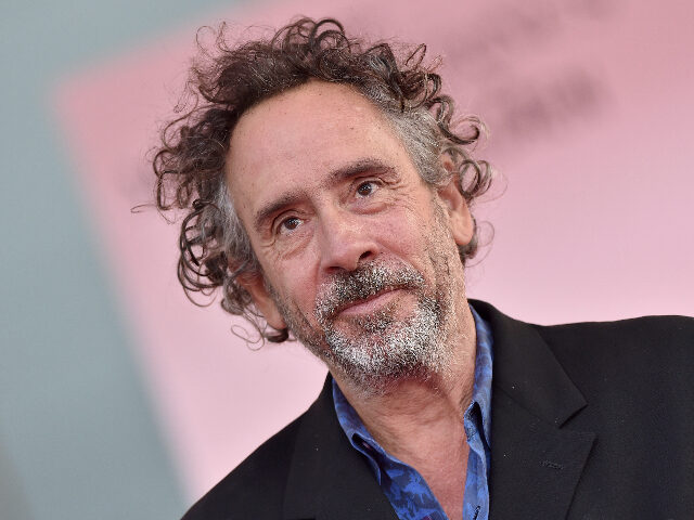 HOLLYWOOD, CA - SEPTEMBER 08: Director Tim Burton is honored with Hand and Footprint Cerem