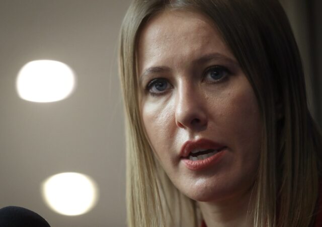 Russian media personality and former presidential candidate Ksenia Sobchak speaks to repor