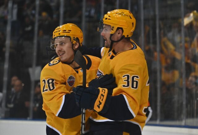 On target: Eeli Tolvanen of the Nashville Predators (left) celebrates with team mate Cole