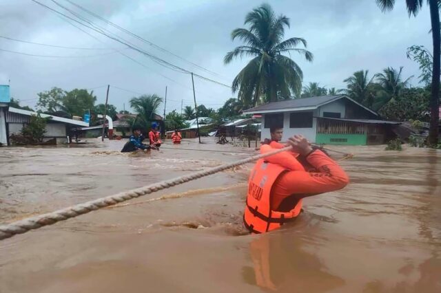 Tropical Storm Nalgae has unleashed flash floods and landslides in parts of the Philippine