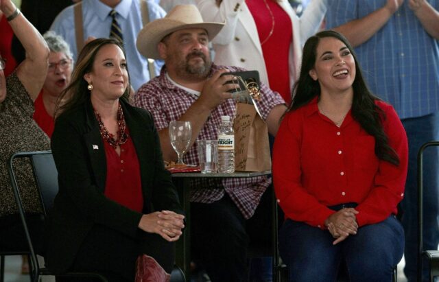 US Republican congressional candidate Monica De La Cruz (L) and Representative Mayra Flore