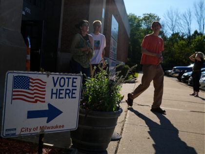 MILWAUKEE, WI - AUGUST 9: Voters leave a polling station during the Wisconsin primary Election Day at Riverside University High School on August 9, 2022 in Milwaukee, Wisconsin. (Photo by Joshua Lott/The Washington Post via Getty Images)