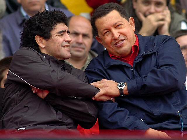 Venezuelan President Hugo Chavez (R) speaks with Argentinian former soccer star Diego Armando Maradona during the "People's Summit" massive rally against the IV Summit of the Americas, in Mar del Plata's stadium 04 November, 2005. During the rally, activists will stress their opposition to the Free Trade Area of the …