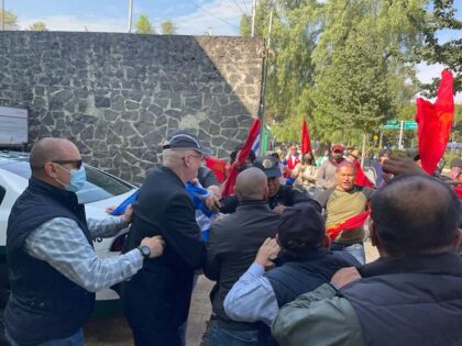 Communist thugs assault pro-freedom protesters outside of the Cuban embassy in Mexico City, Mexico, November 21, 2022.
