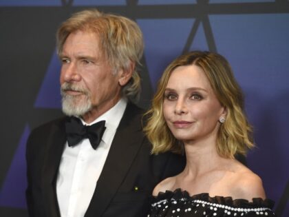 Harrison Ford, left, and Calista Flockhart arrive at the Governors Awards on Sunday, Nov. 18, 2018, at the Dolby Theatre in Los Angeles. (Photo by Jordan Strauss/Invision/AP)
