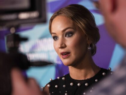 Jennifer Lawrence is interviewed upon arrival for the premiere of the film 'Causeway' duri