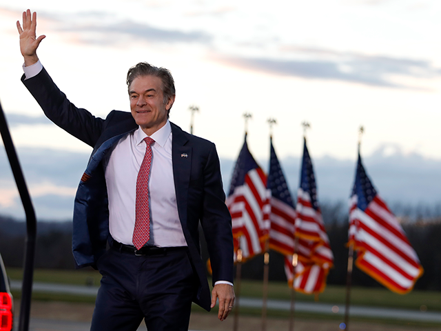 Republican candidate for U.S. Senate Dr. Mehmet Oz waves before addressing an election ral