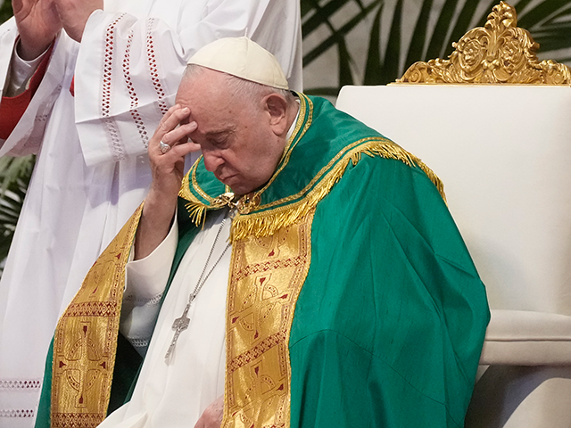 Pope Francis pauses as he celebrates a mass on the occasion of the World Day of the Poor i