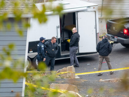 Officers investigate a homicide at an apartment complex south of the University of Idaho campus on Sunday, Nov. 13, 2022. Four people were found dead on King Road near the campus, according to a city of Moscow news release issued Sunday afternoon. (Zach Wilkinson/Moscow-Pullman Daily News via AP)