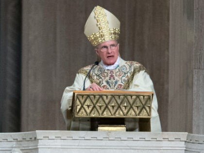 FILE - Archbishop Timothy Broglio conducts an Easter Sunday Mass in an empty sanctuary at Basilica of the National Shrine of the Immaculate Conception in Washington, Sunday, April 12, 2020. Broglio of the Military Services, who oversees Catholic ministries to the U.S. armed forces, was elected Tuesday, Nov. 15, 2022, …