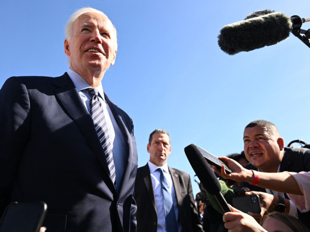 US President Joe Biden talks to the media before boarding Air Force One at Marine Corps Ai