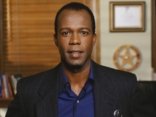 Promotional portrait of American actor Clarence Gilyard Jr (as James 'Jimmy' Trivette), dressed in a pin-stripe suit, for the television series 'Walker, Texas Ranger,' . (Photo by CBS Photo Archvie/Getty Images)