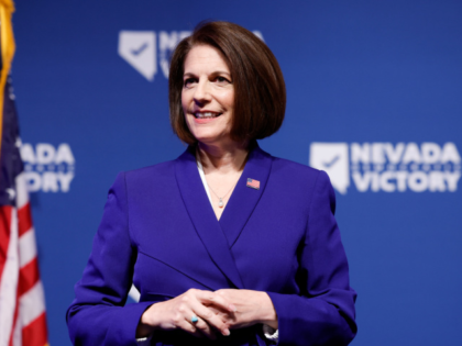 LAS VEGAS, NEVADA - NOVEMBER 08: U.S. Sen. Catherine Cortez Masto (D-NV) listens as Nevada Gov. Steve Sisolak delivers remarks at an election night party hosted by Nevada Democratic Victory at The Encore on November 08, 2022 in Las Vegas, Nevada. Sen. Catherine Cortez Masto (D-NV) is facing Republican challenger …