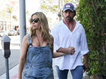 LOS ANGELES, CA - AUGUST 13: Denise Richards and her husband Aaron Phypers are seen on Aug