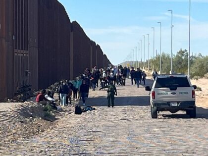 Ajo Station Border Patrol agents apprehend a group of 56 migrants near the border wall west of Lukeville, AZ. (U.S. Border Patrol/Tucson Sector)
