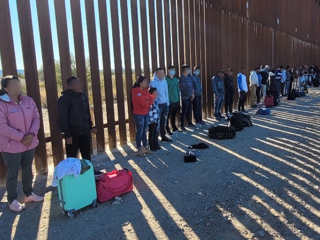 Ajo Station Border Patrol agents find a group of 94 migrants along the border wall near Lu